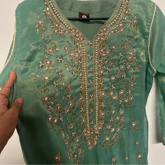 Two piece formal salwar kameez in a soft sea-green shade with intricate gold - Picture 6 of 9